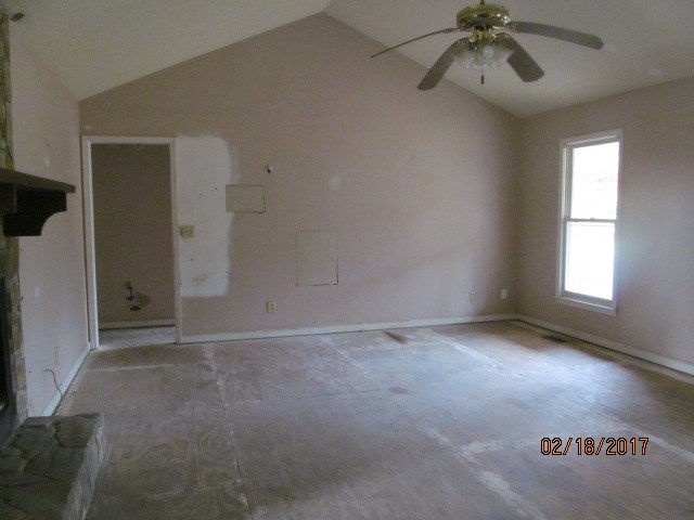 6501 Barfield Road Macon, GA 31216 - Photo 5 of 13 an empty room with windows and fan