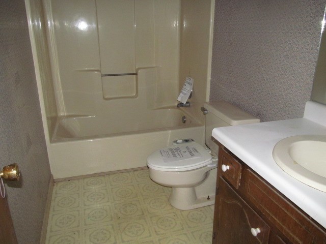 6501 Barfield Road Macon, GA 31216 - Photo 7 of 13 a bathroom with a sink toilet and shower