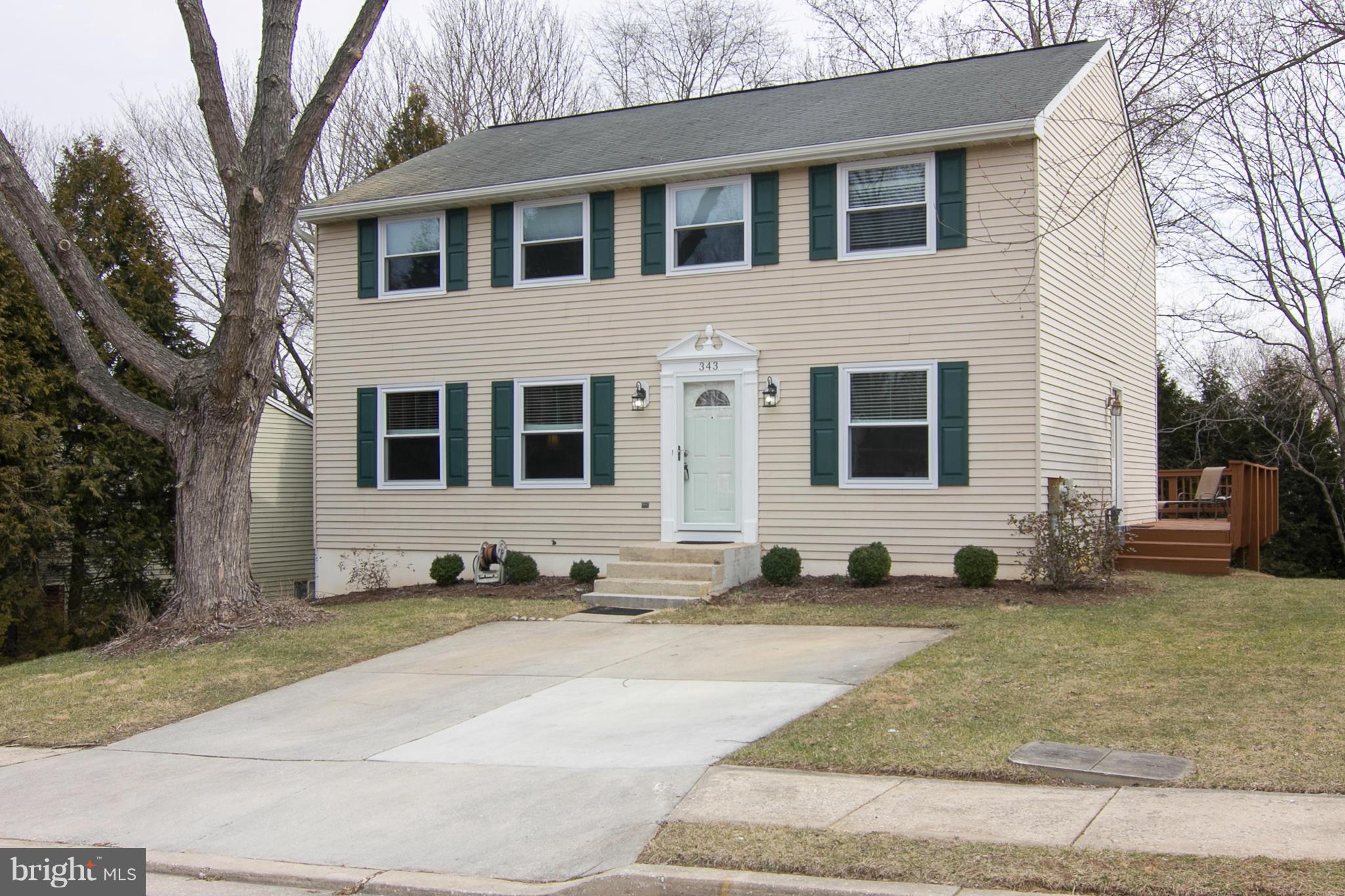 343 Timber Grove Road Owings Mills, MD 21117 - Photo 1 of 29 a view of house with yard in front of it