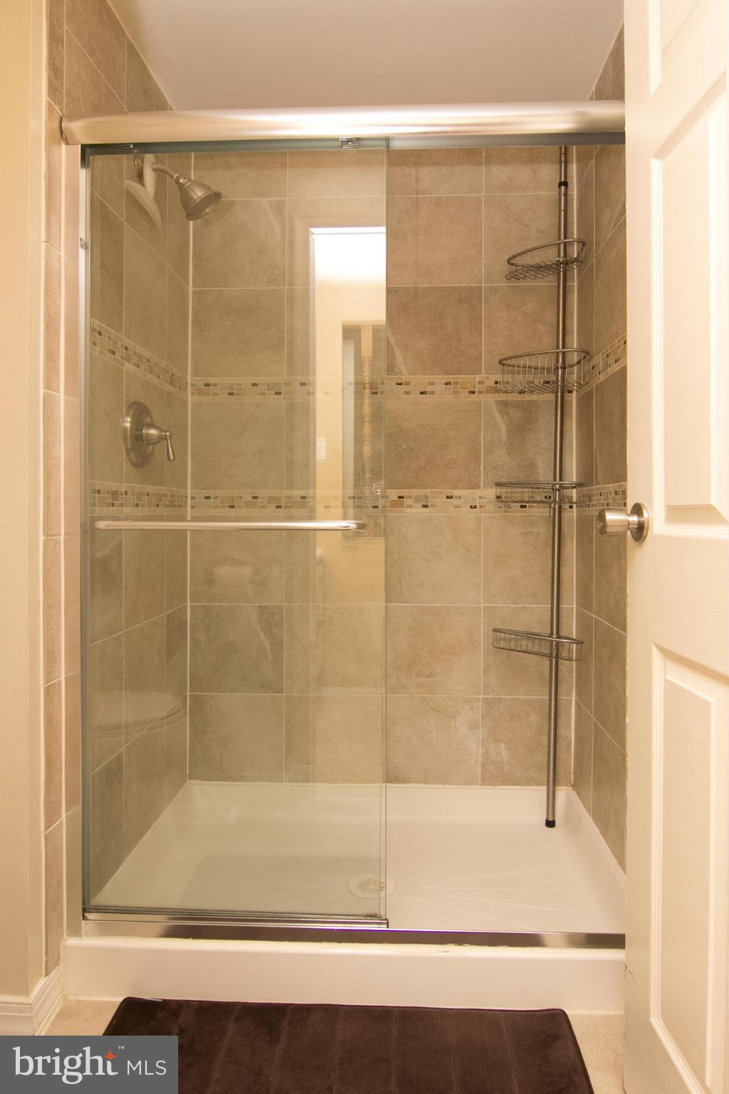 343 Timber Grove Road Owings Mills, MD 21117 - Photo 16 of 29 a bathroom with a shower