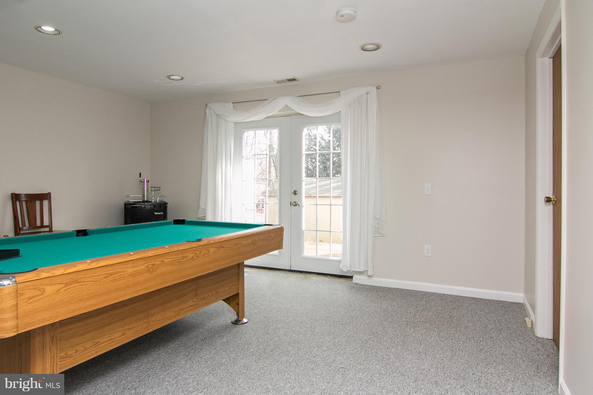 343 Timber Grove Road Owings Mills, MD 21117 - Photo 26 of 29 a room with pool table and windows