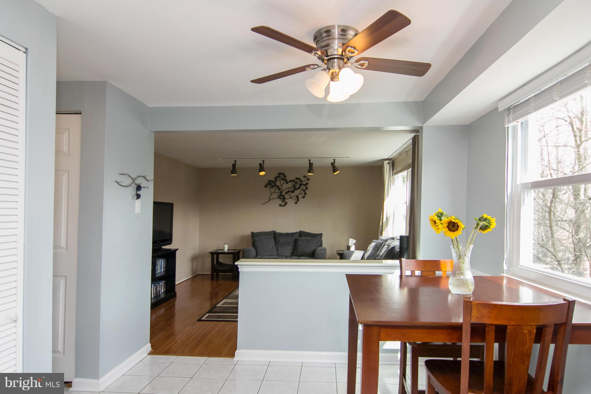 343 Timber Grove Road Owings Mills, MD 21117 - Photo 4 of 29 a view of a dining room with furniture and a window