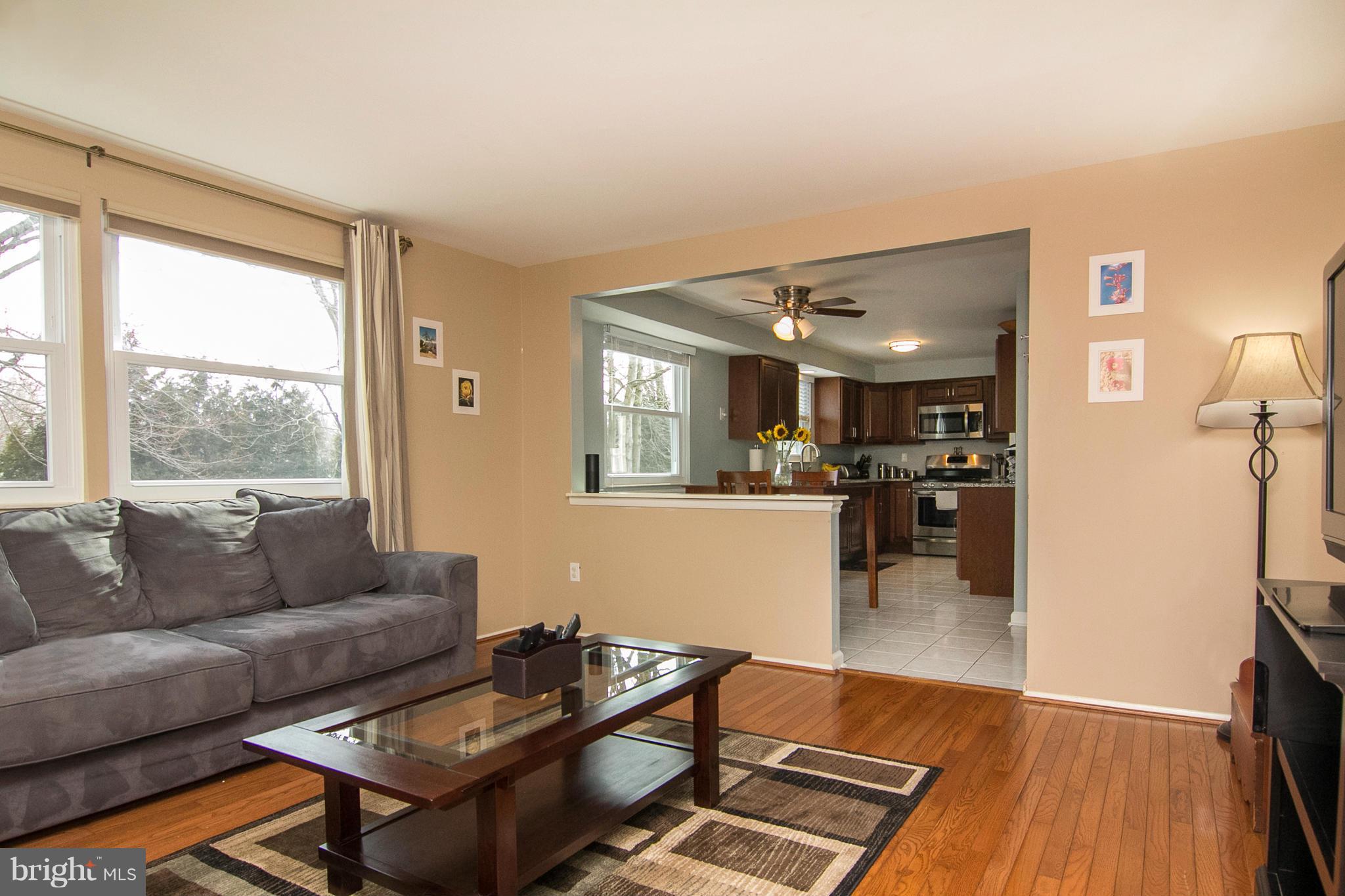 343 Timber Grove Road Owings Mills, MD 21117 - Photo 6 of 29 a living room with furniture and a wooden floor