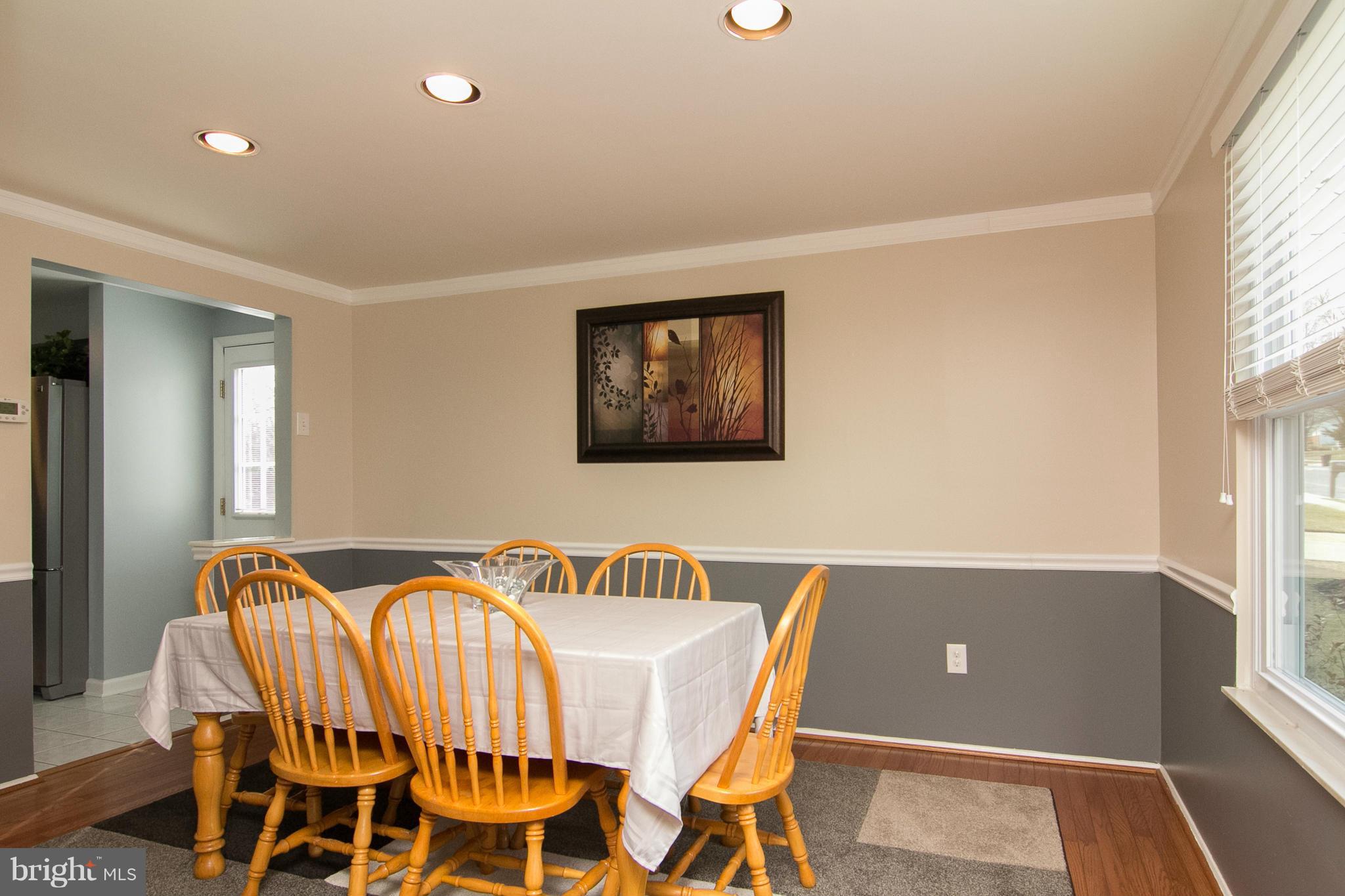 343 Timber Grove Road Owings Mills, MD 21117 - Photo 7 of 29 a view of a dining room with furniture and window