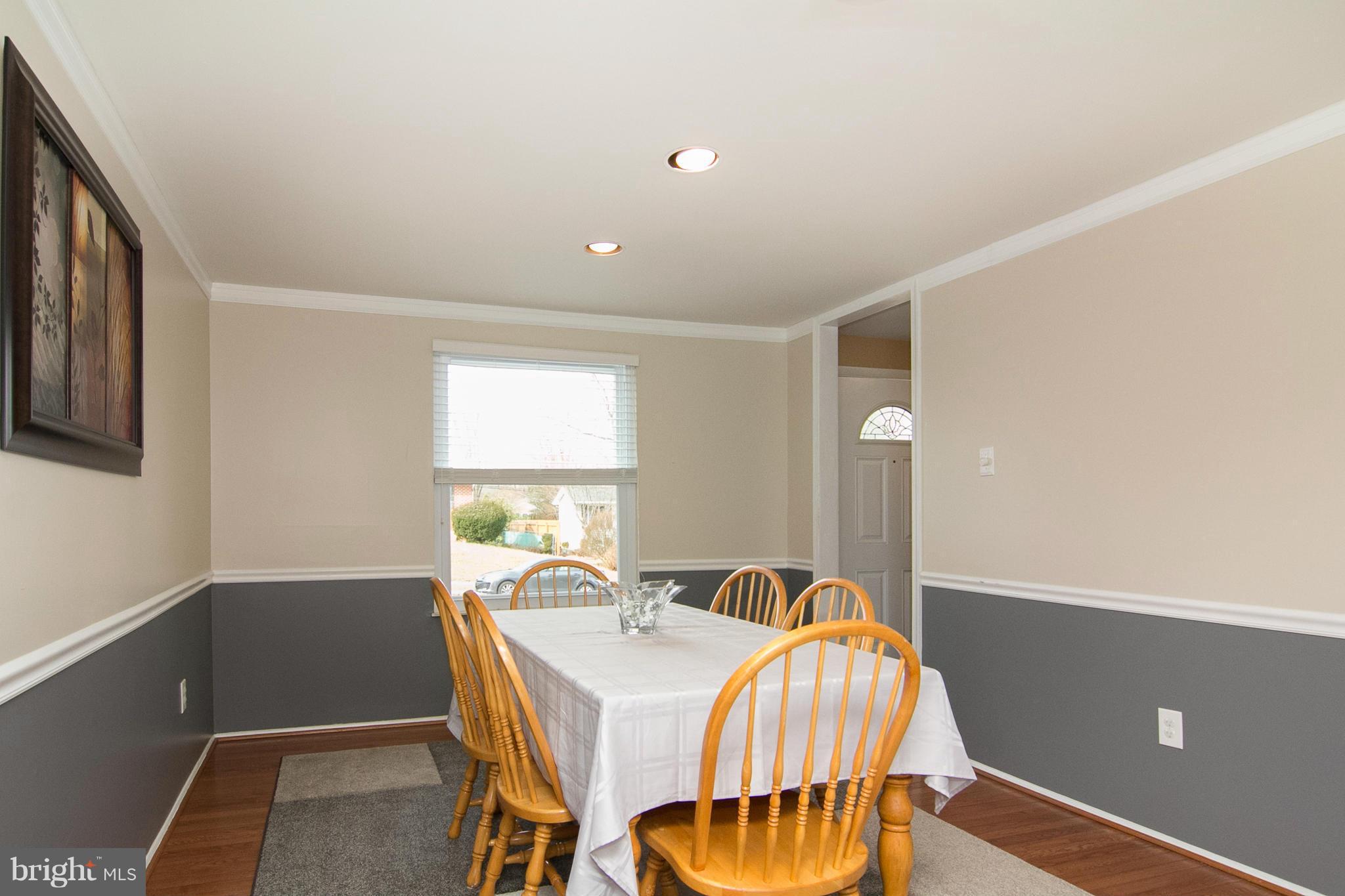 343 Timber Grove Road Owings Mills, MD 21117 - Photo 8 of 29 a bedroom with a bed and a window