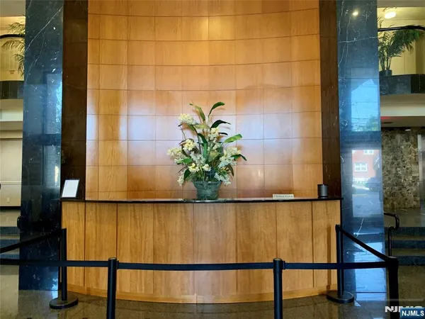 a lobby with a chandelier