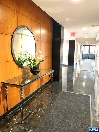 a bathroom with a sink and a shower