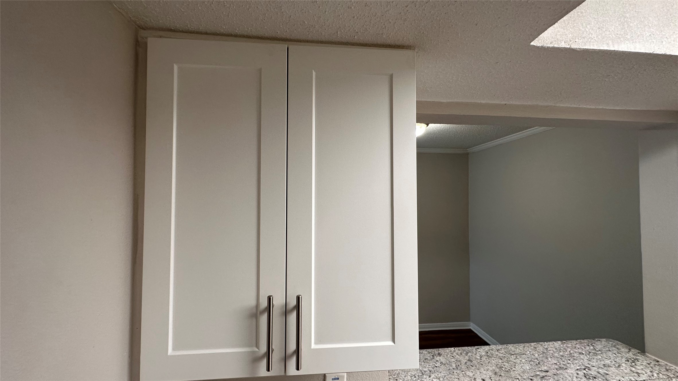 7315 Brompton Street, Unit 127B Houston, TX 77025 - Photo 12 of 13 a view of bedroom and hallway