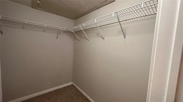 a view of a room with racks on the wall