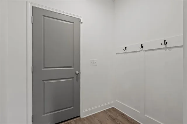 a view of small space with wooden floor