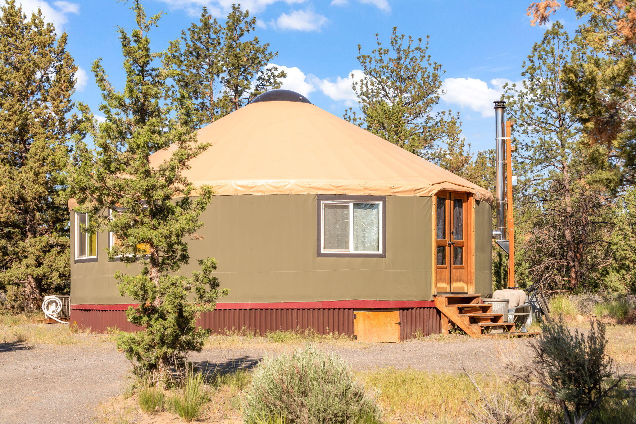 60360 Horse Butte Road Bend, OR 97702 - Photo 10 of 58 a view of a house with swimming pool
