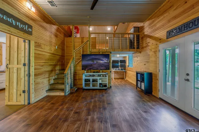 a view of livingroom with furniture wooden floor and window