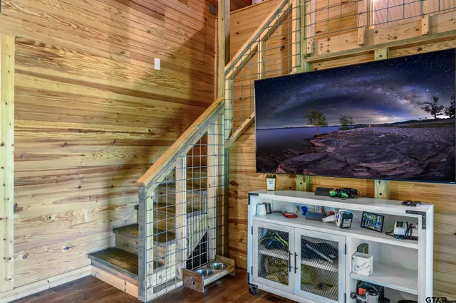 a view of entryway with wooden stairs