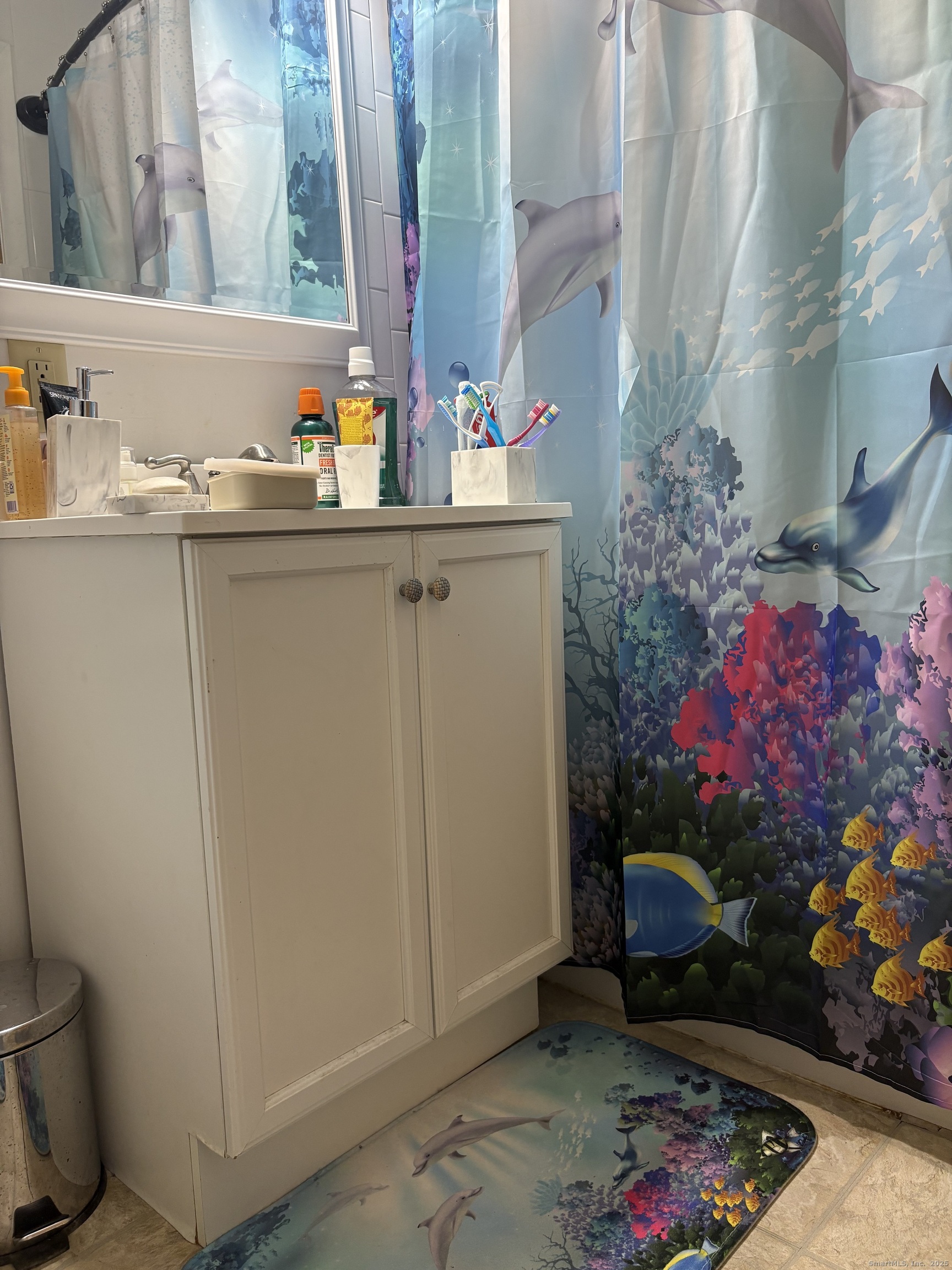 962 High Path Road, Unit 962 Windsor, CT 06095 - Photo 11 of 14 a bathroom with a sink toilet and a mirror