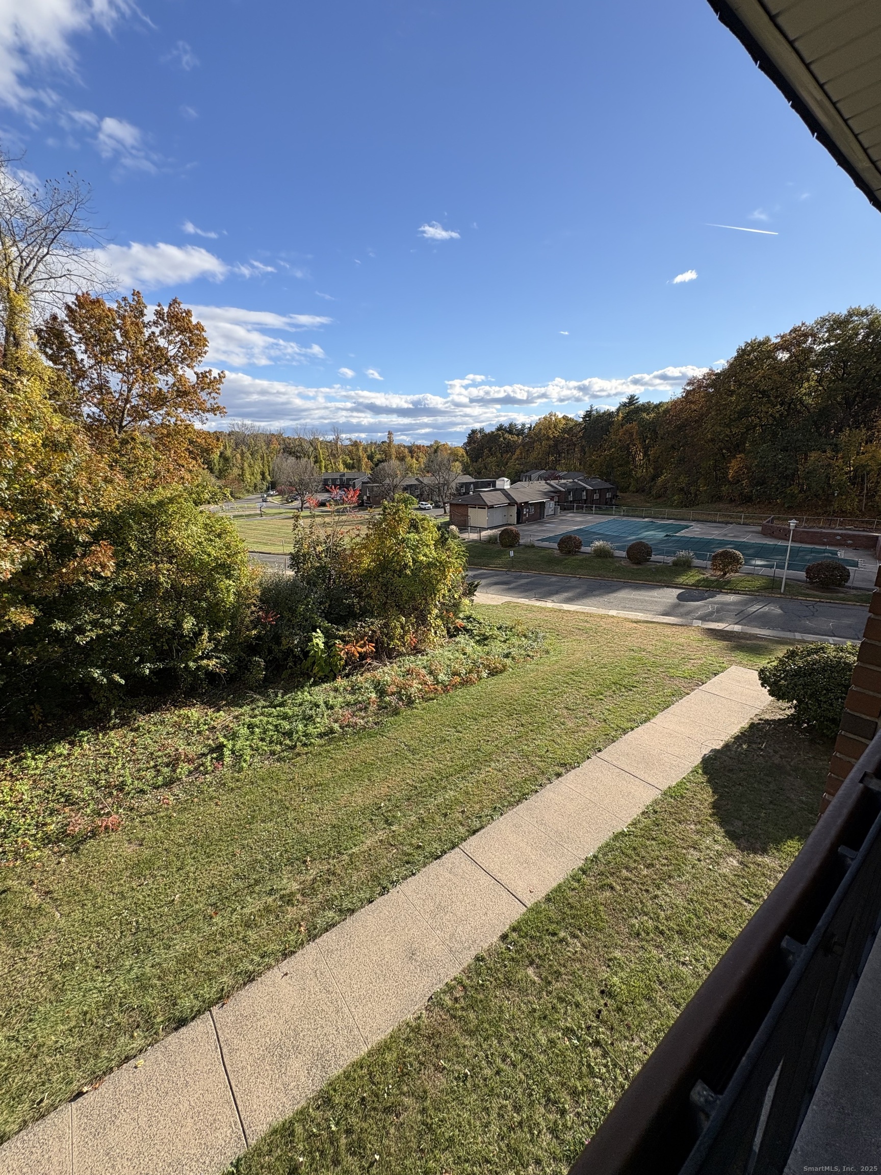 962 High Path Road, Unit 962 Windsor, CT 06095 - Photo 13 of 14 a view of a lake with a yard