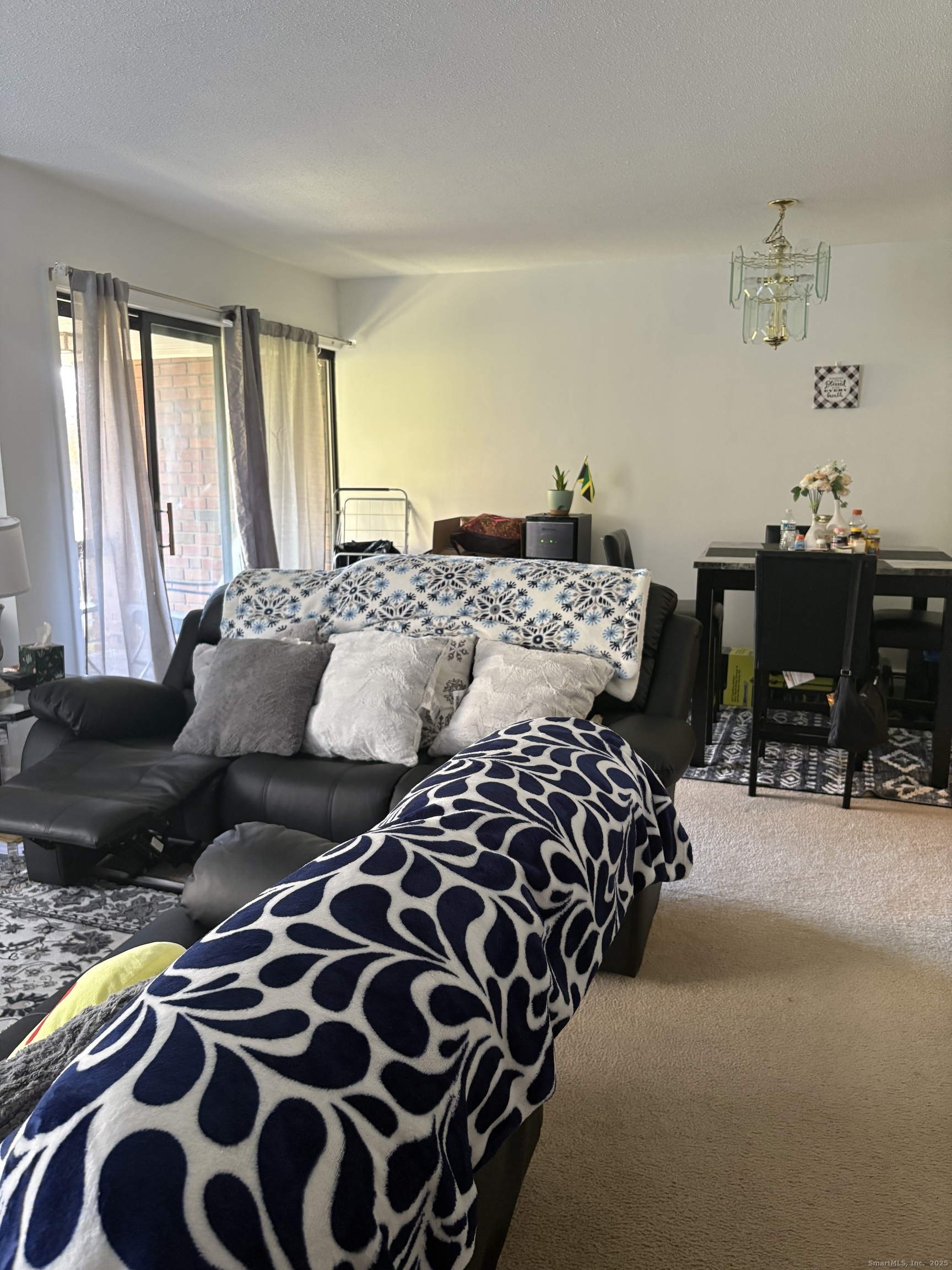 962 High Path Road, Unit 962 Windsor, CT 06095 - Photo 3 of 14 a bedroom with bed and a window