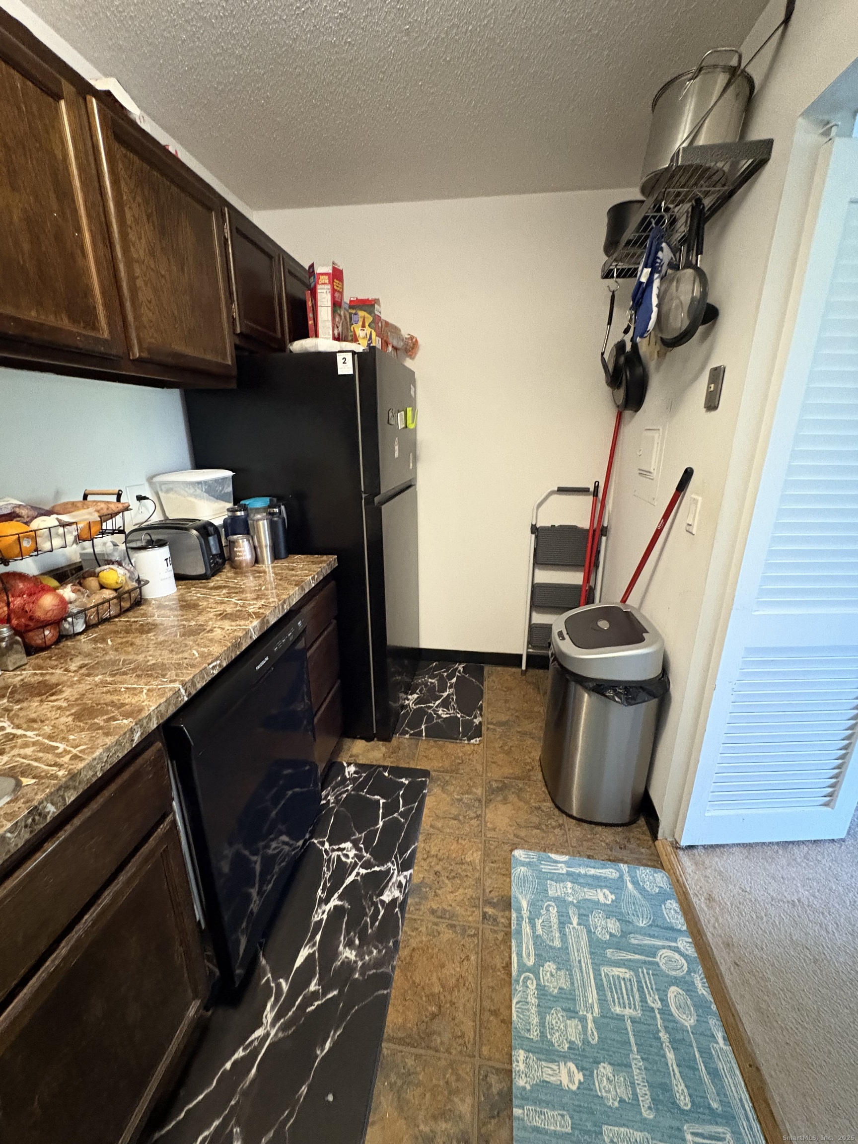 962 High Path Road, Unit 962 Windsor, CT 06095 - Photo 7 of 14 a kitchen with a sink and a stove top oven