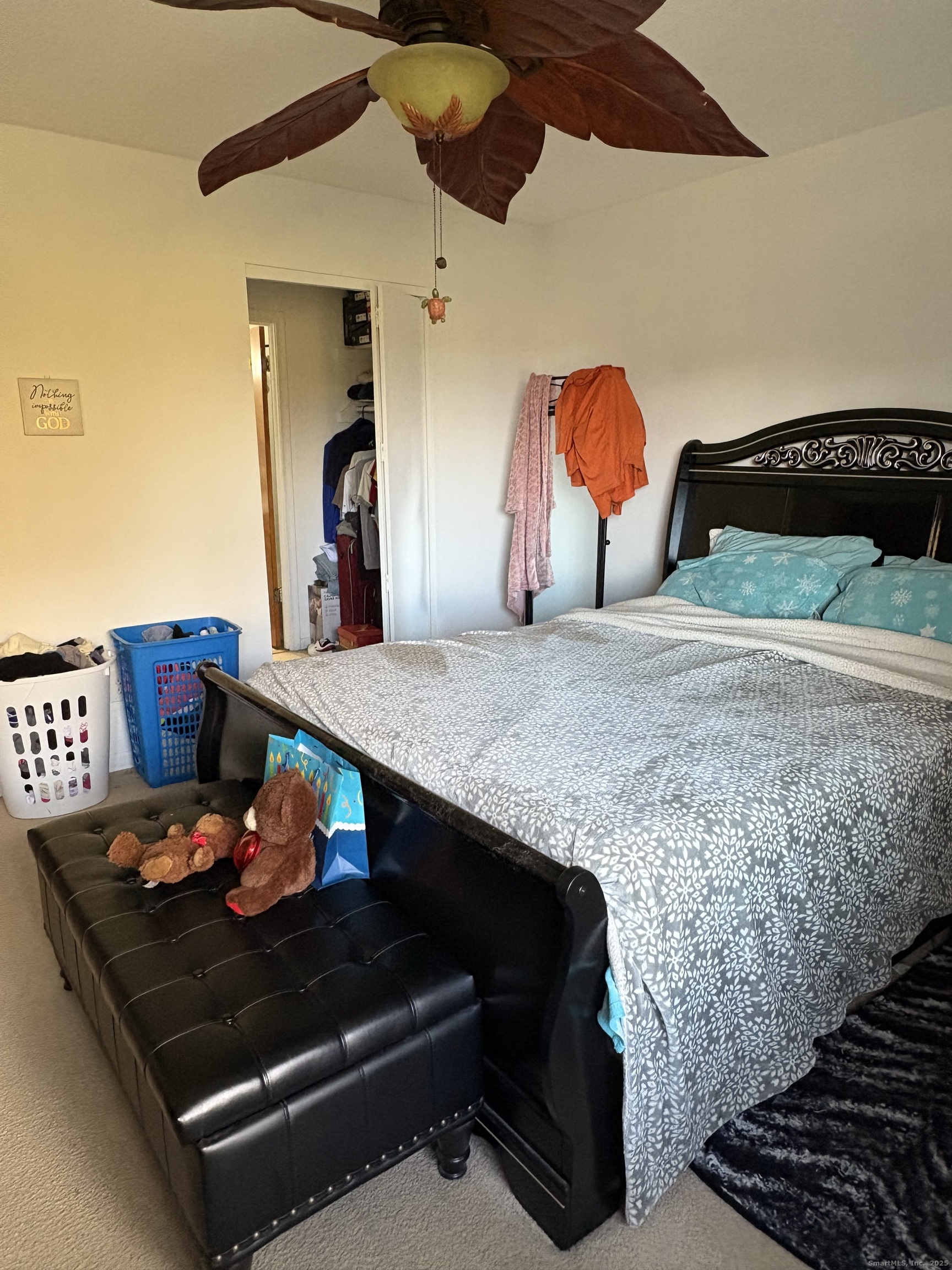962 High Path Road, Unit 962 Windsor, CT 06095 - Photo 9 of 14 a living room with furniture and wooden floor
