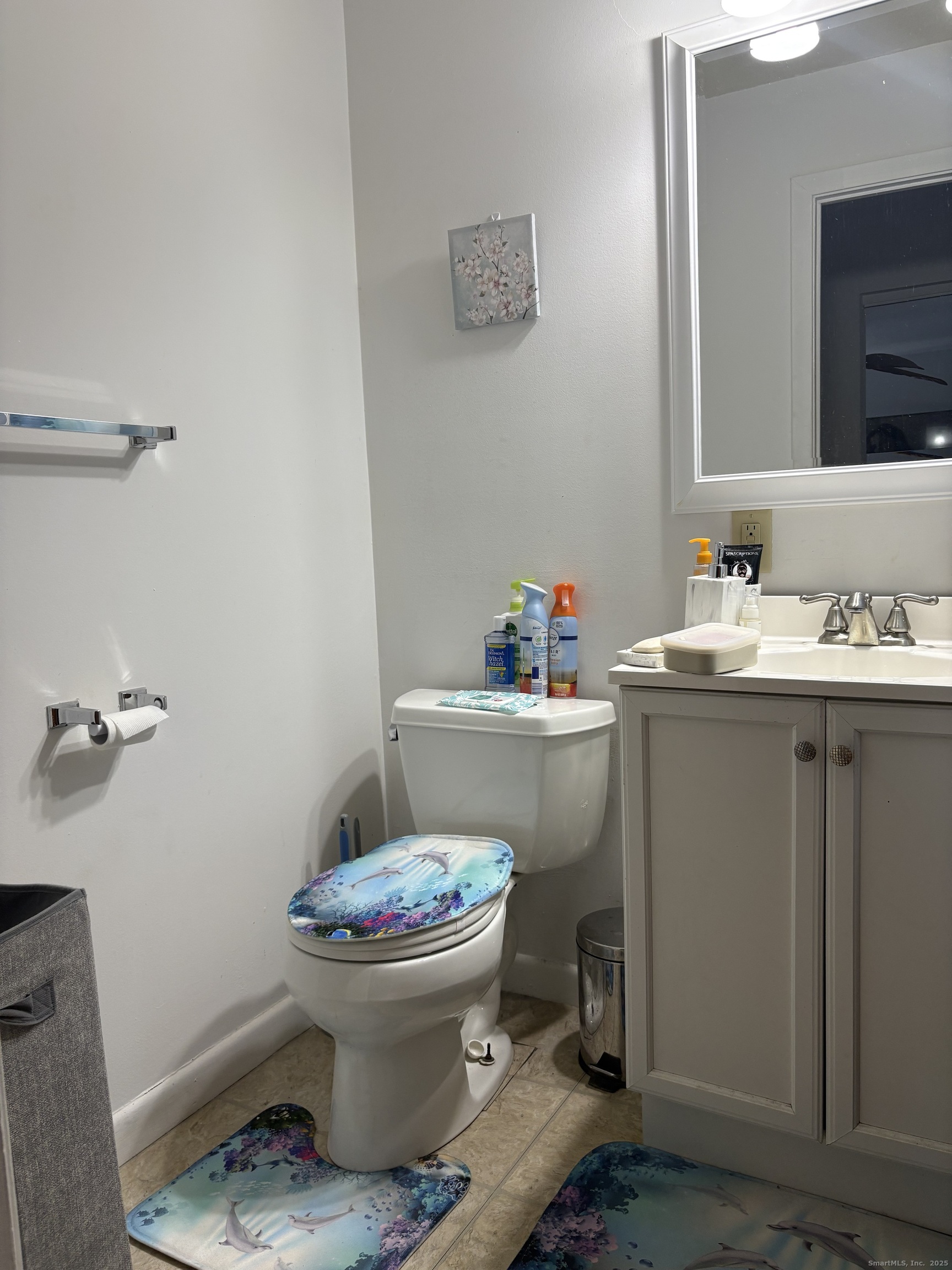 962 High Path Road, Unit 962 Windsor, CT 06095 - Photo 10 of 14 a bathroom with a sink toilet and a mirror