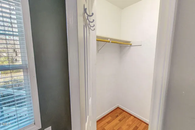 a view of a room that has a window in it