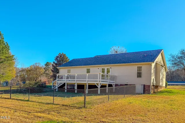a view of a swimming pool with seating area