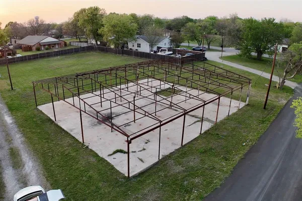 a view of a lake with a yard