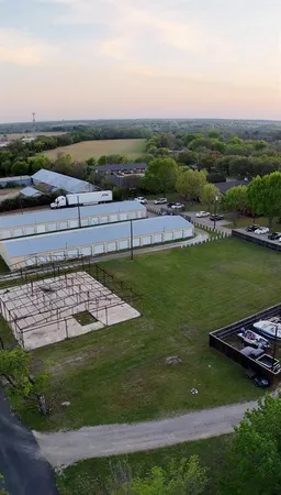 a view of a lake with a yard
