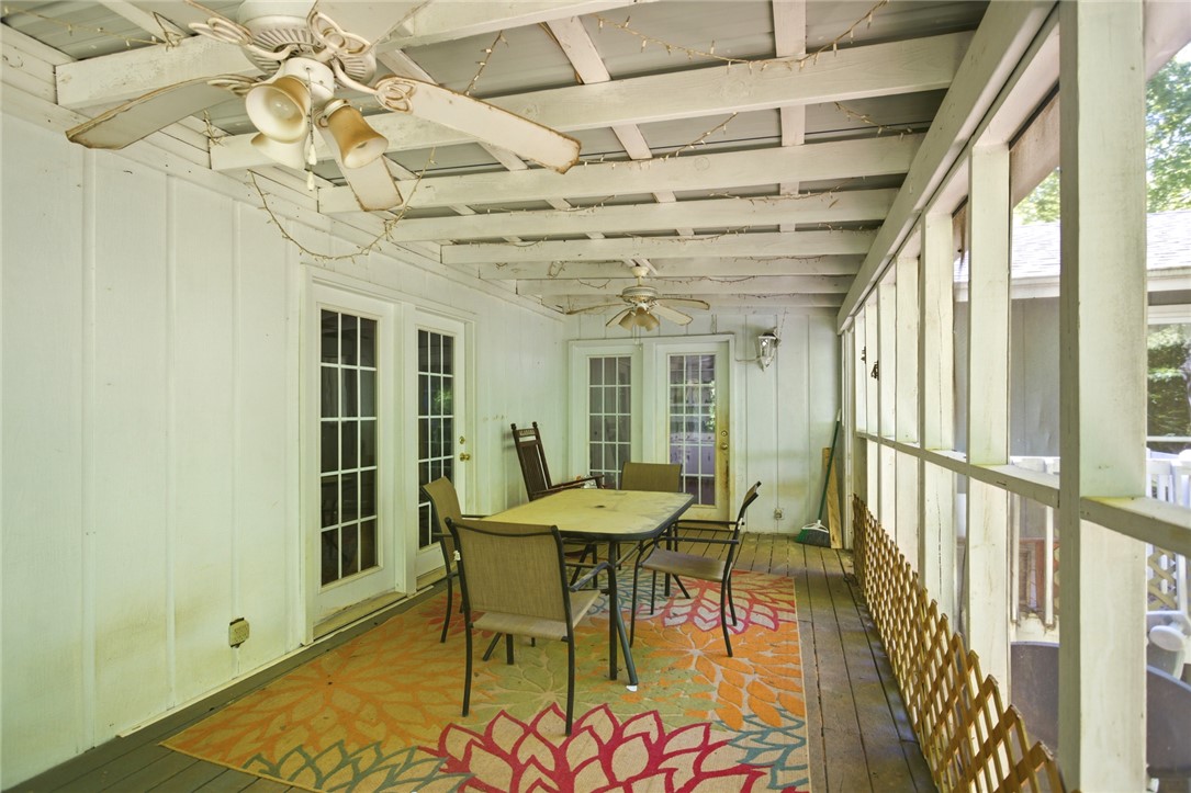 311 Cumberland Way Anderson, SC 29621 - Photo 36 of 44 Relax and unwind in this inviting covered patio, featuring dual ceiling fans and French doors leading to the interior.