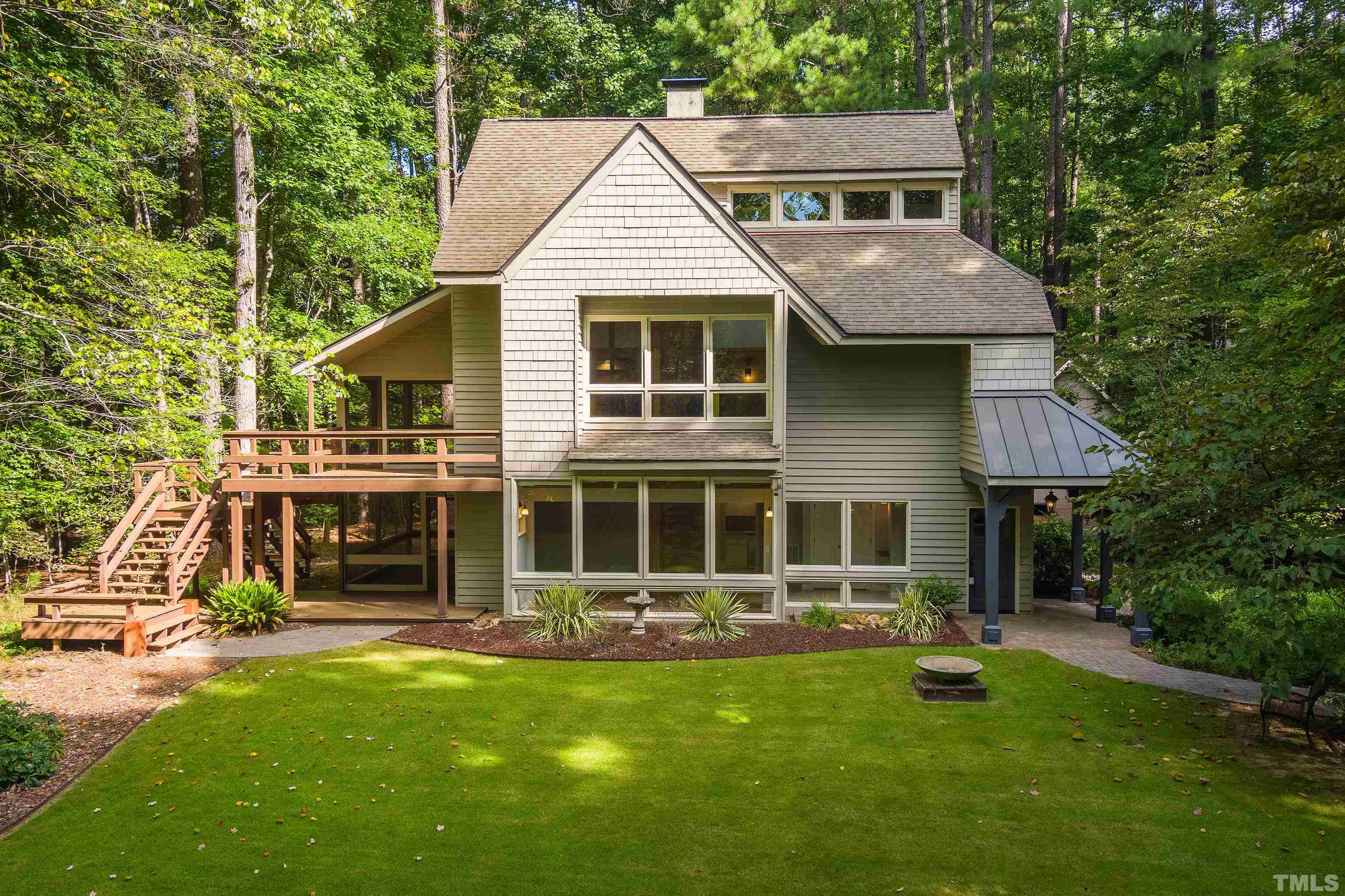 12217 Old Creedmoor Road Raleigh, NC 27613 - Photo 1 of 41 front view of a house with a yard