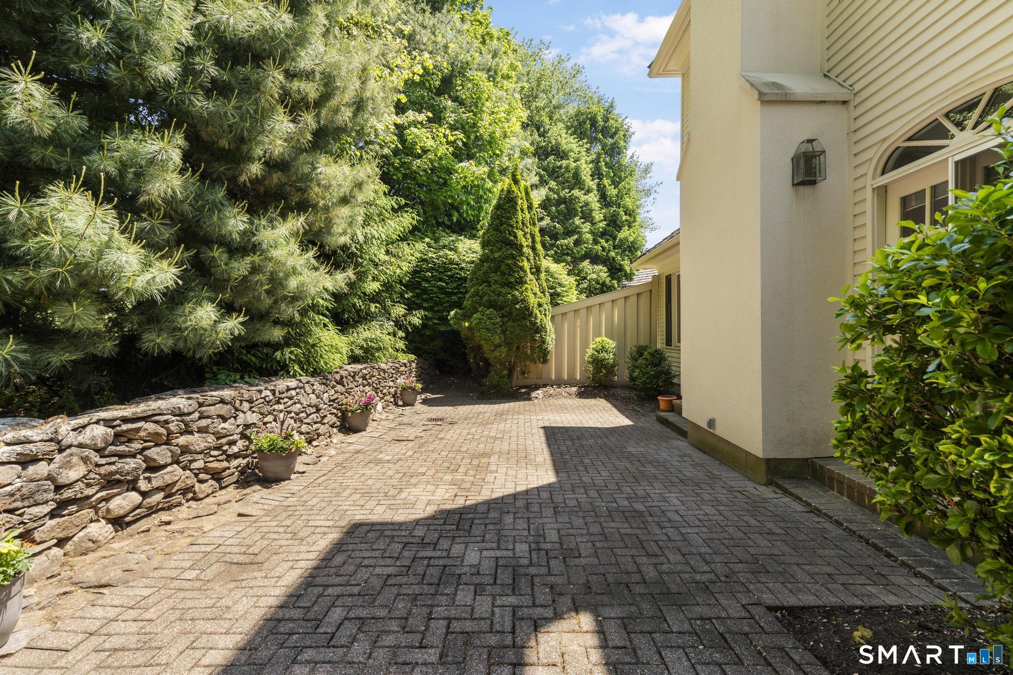 130 Stillson Road, Unit 130 Fairfield, CT 06825 - Photo 33 of 38 Back patio