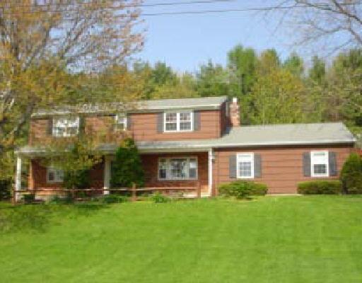 25 Hills Point Road Trumbull, CT 06611 - Photo 1 of 1 front view of house with a yard