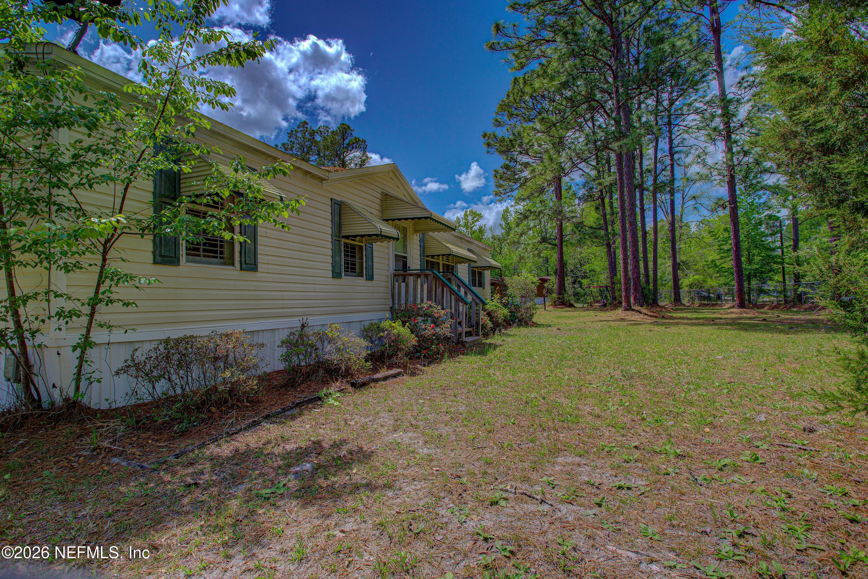 28050 Roundup Place Hilliard, FL 32046 - Photo 11 of 43 20260402-28050_Roundup_Pl-26