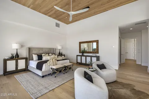 a bedroom with furniture and a couch