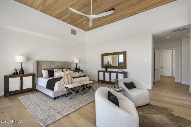 a bedroom with furniture and a couch