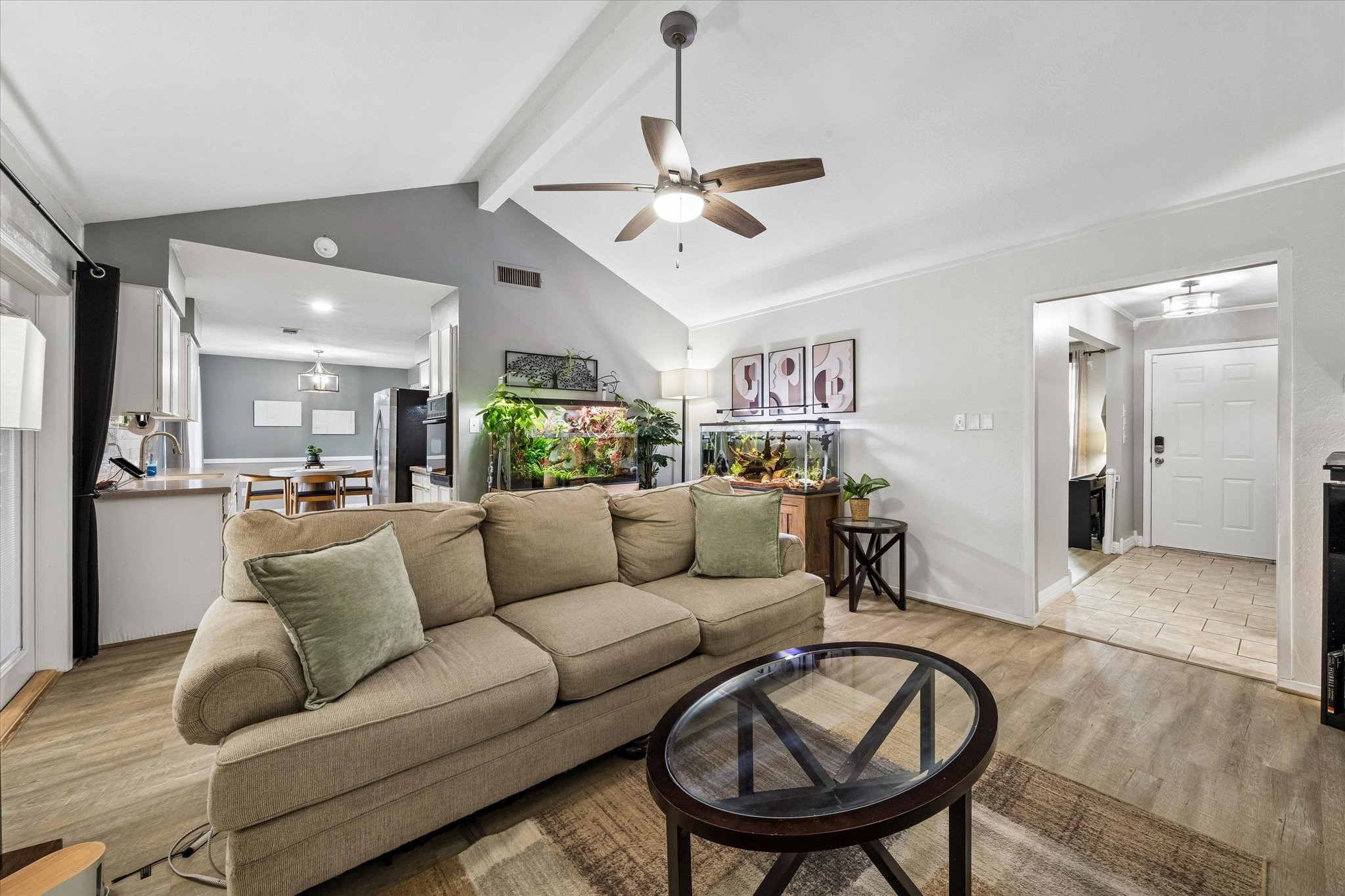1931 Westlake Road Houston, TX 77062 - Photo 2 of 28 This family room is made to help you slow down and settle in, with a vaulted ceiling, LVP flooring and plenty of space to relax, stretch out and enjoy everyday moments from the comfort of home.
