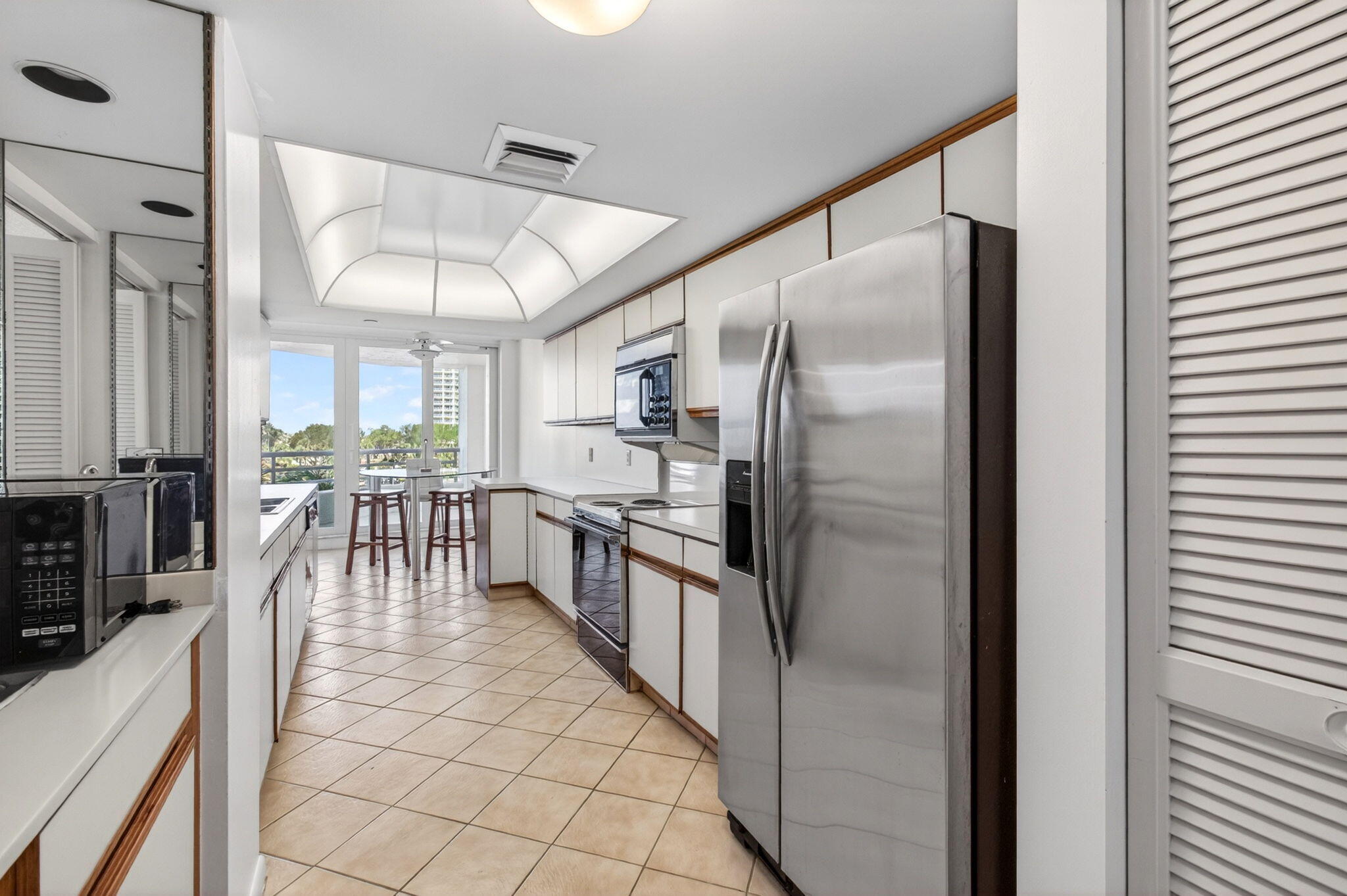 4201 North Ocean Boulevard, Unit C 307 Boca Raton, FL 33431 - Photo 12 of 31 Large Kitchen with Side Bar