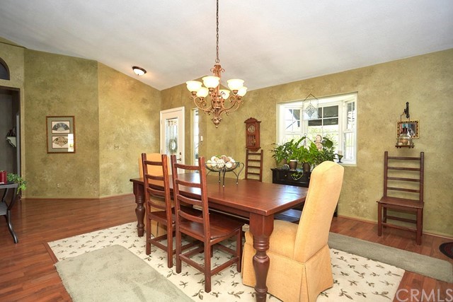 20058 Rancherias Lane Apple Valley, CA 92307 - Photo 19 of 83 a dining room with furniture and wooden floor