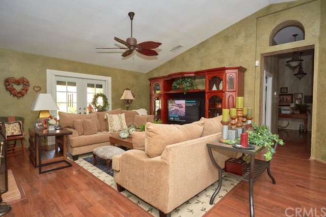 20058 Rancherias Lane Apple Valley, CA 92307 - Photo 21 of 83 a living room with furniture and a fireplace