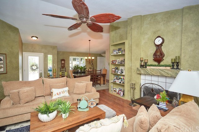 20058 Rancherias Lane Apple Valley, CA 92307 - Photo 24 of 83 a living room with furniture and a chandelier