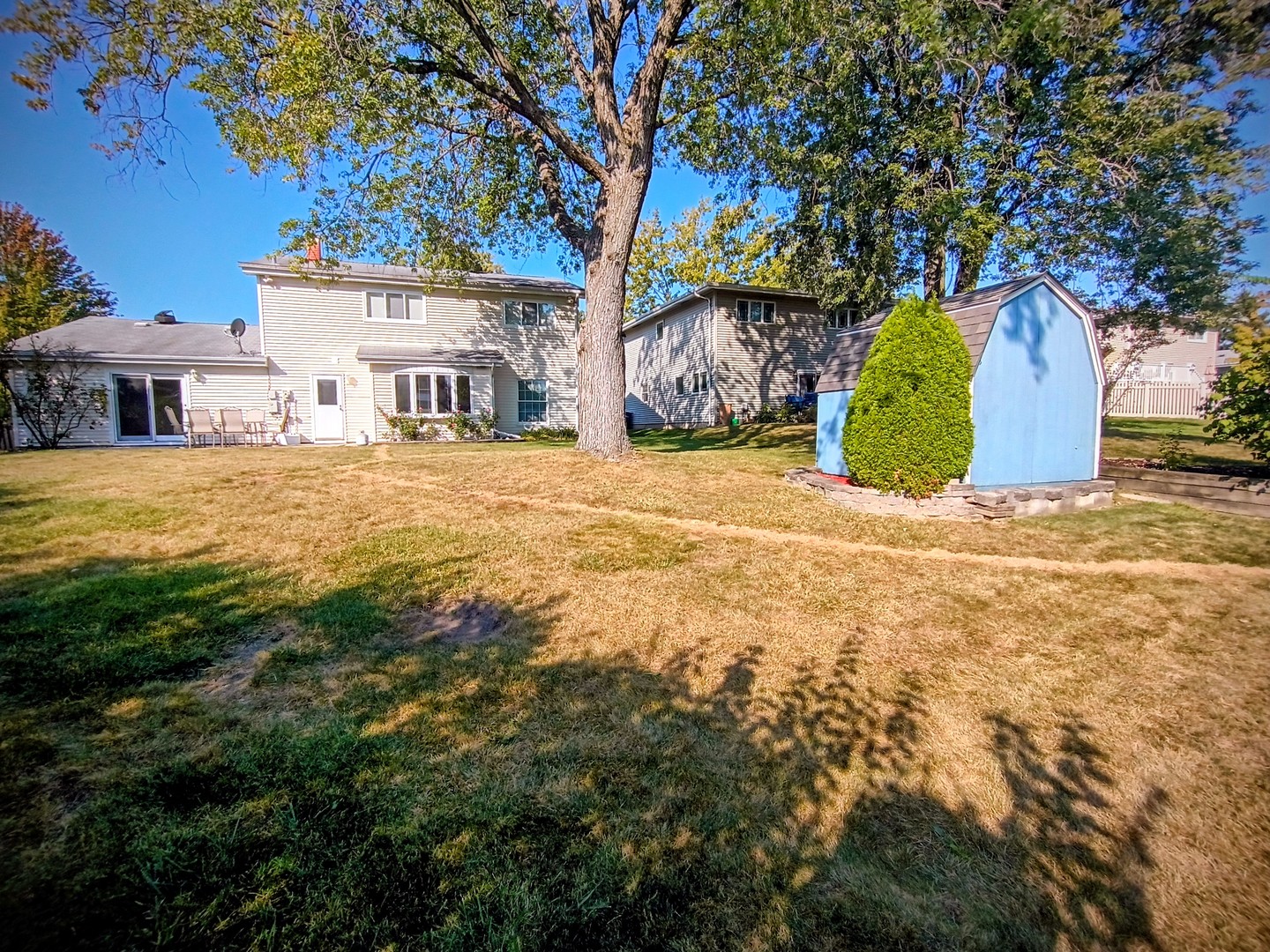 1367 South Elizabeth Street Lombard, IL 60148 - Photo 21 of 21 a view of a house with a yard and large tree