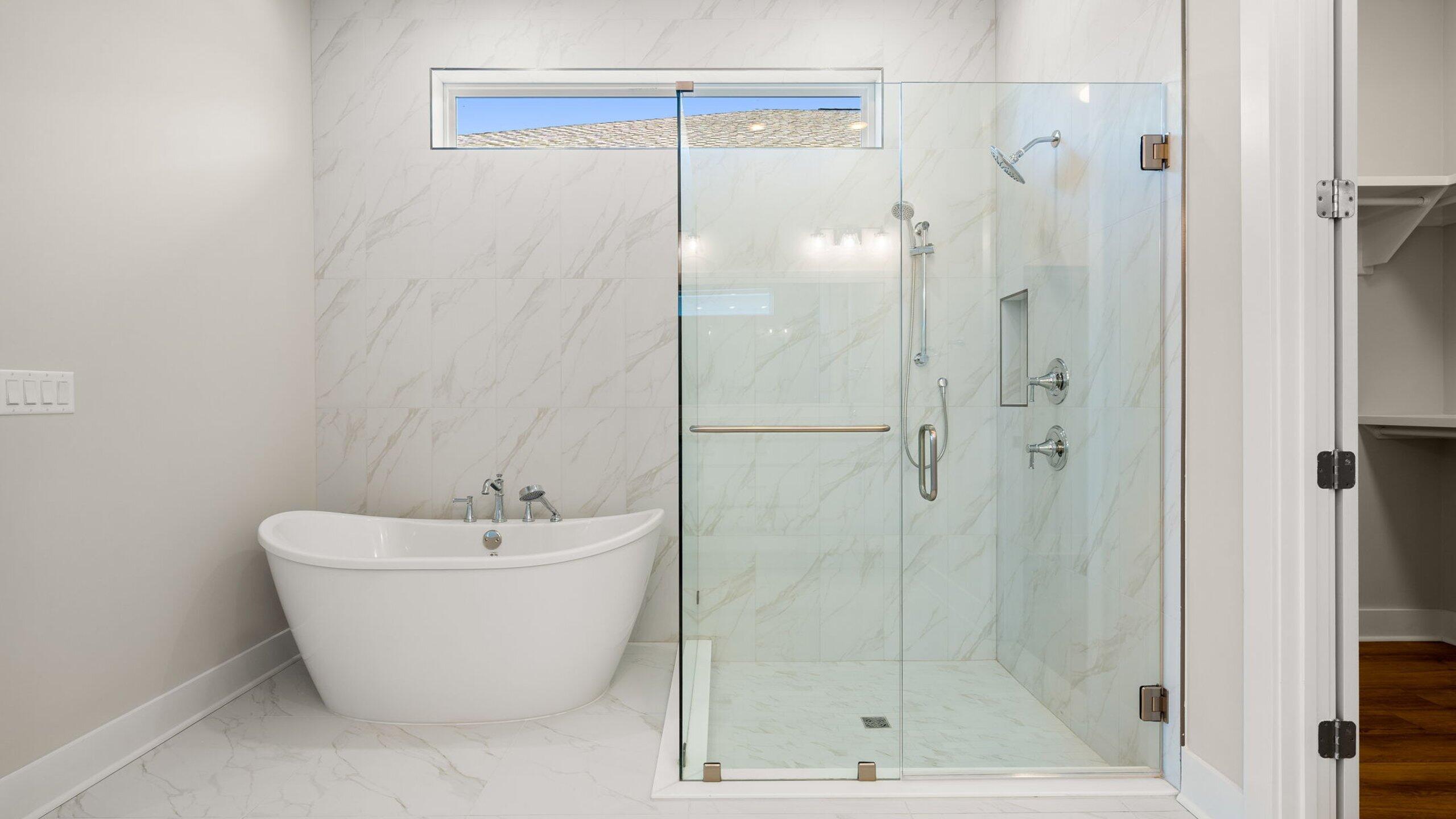 40 Dunns Circle Inlet Beach, FL 32461 - Photo 12 of 69 a bathroom with a white bath tub a shower and a sink