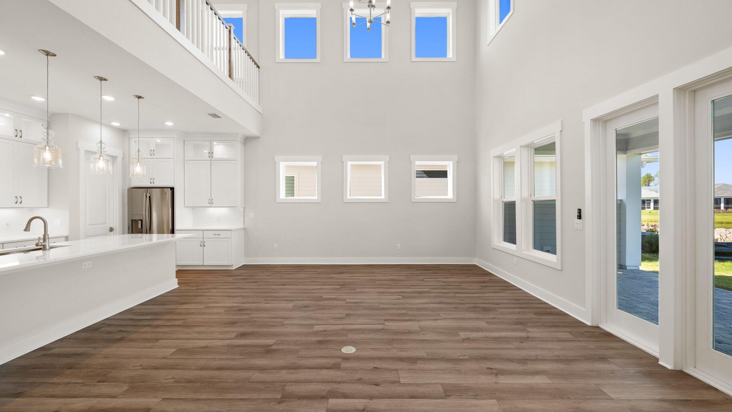 40 Dunns Circle Inlet Beach, FL 32461 - Photo 16 of 69 a view of a big room with wooden floor and a kitchen