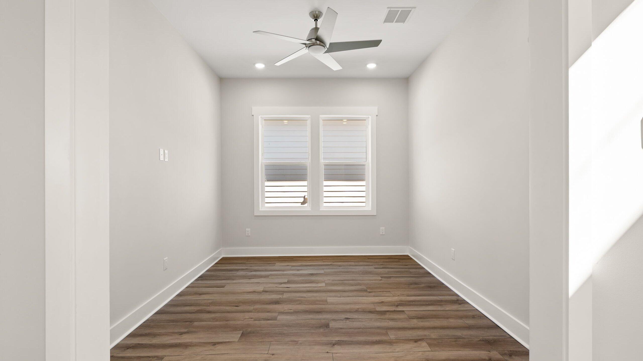 40 Dunns Circle Inlet Beach, FL 32461 - Photo 24 of 69 a view of an empty room with wooden floor and a window