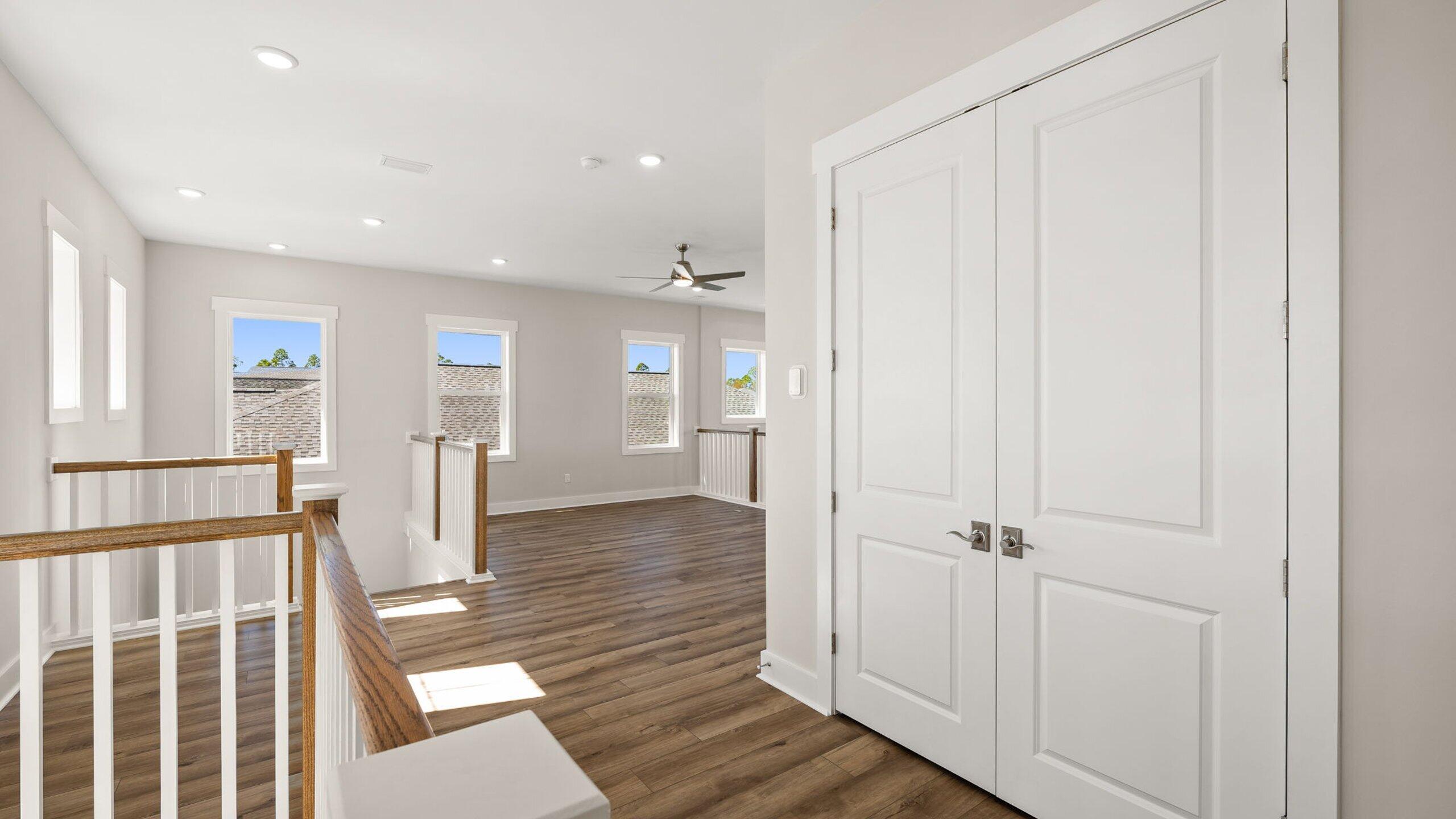 40 Dunns Circle Inlet Beach, FL 32461 - Photo 33 of 69 a view of a hallway with wooden floor and closet area