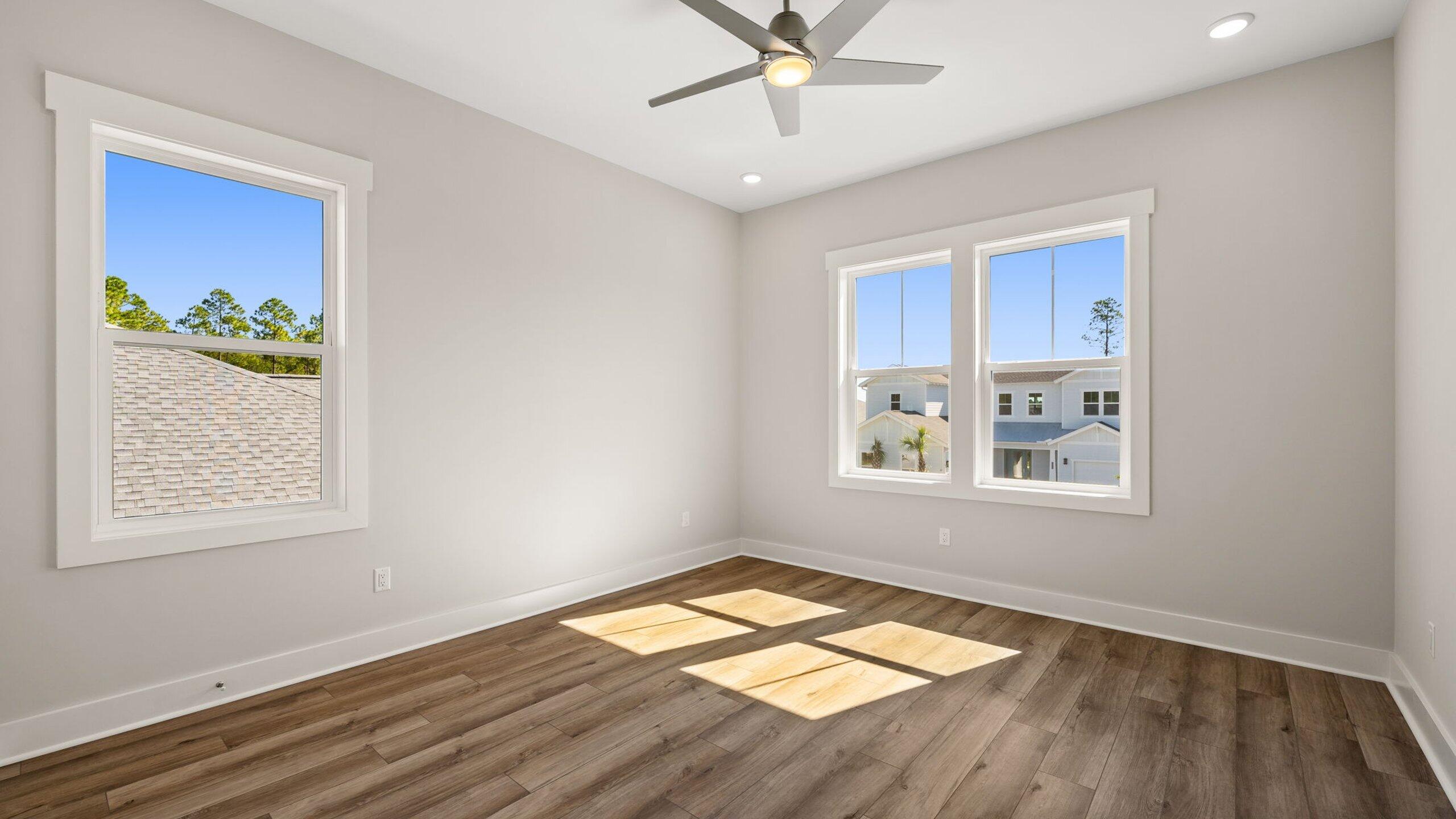 40 Dunns Circle Inlet Beach, FL 32461 - Photo 39 of 69 a view of an empty room with wooden floor and a window
