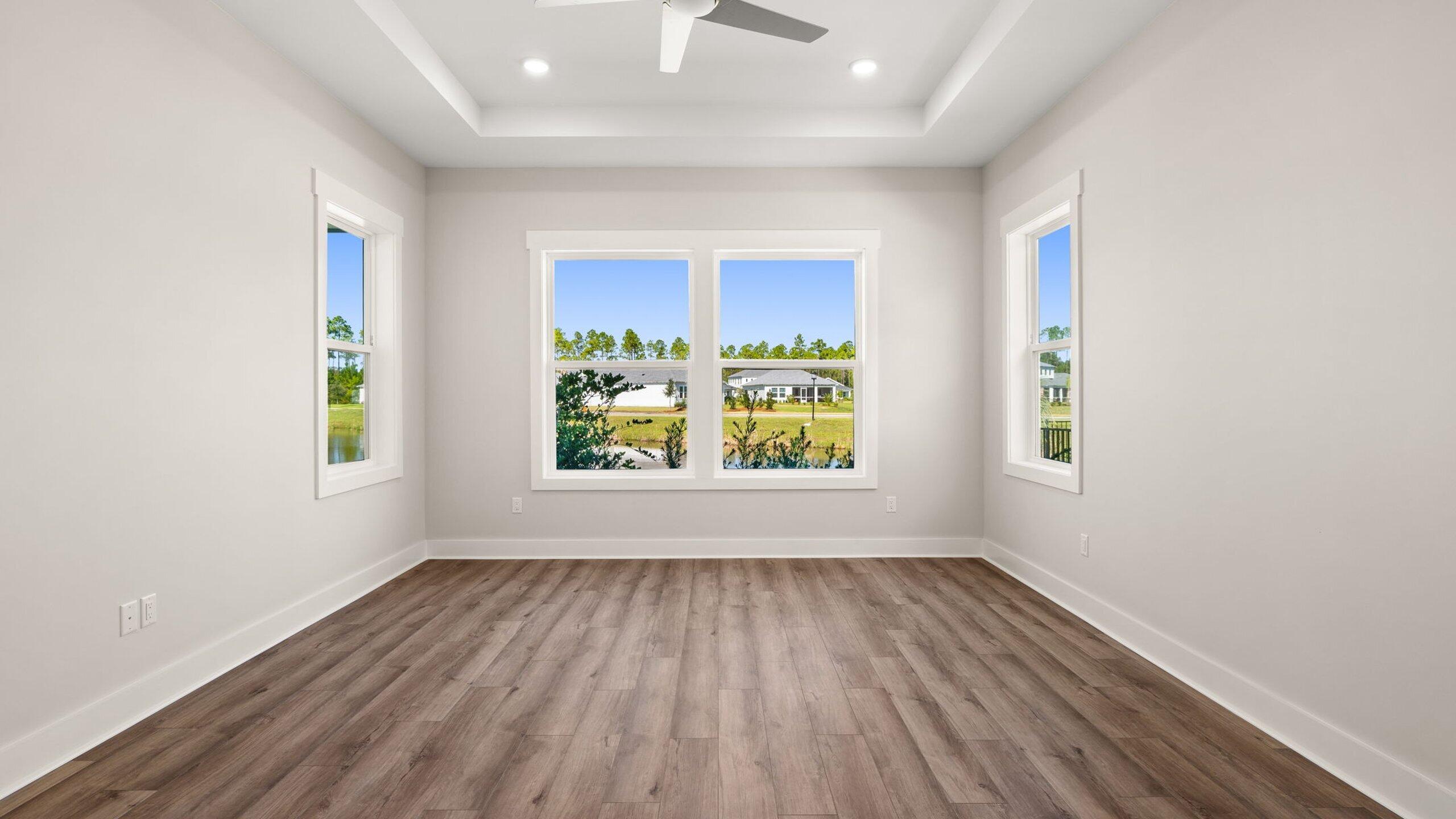 40 Dunns Circle Inlet Beach, FL 32461 - Photo 9 of 69 an empty room with wooden floor and windows