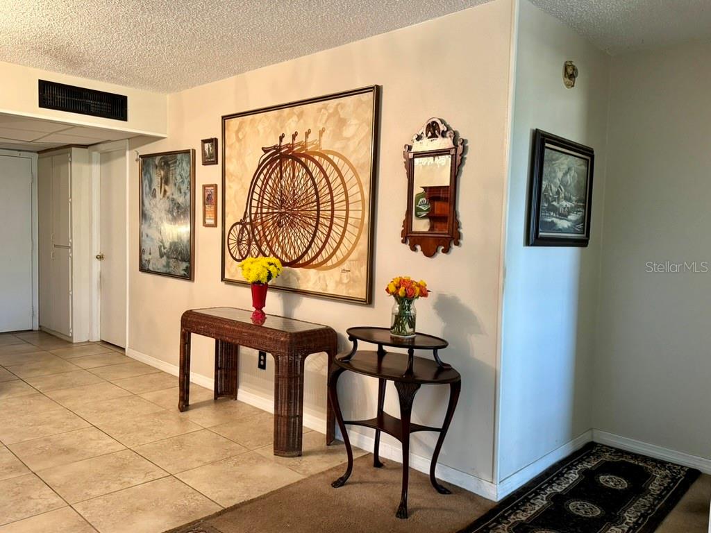 12300 Vonn Road, Unit 5304 Largo, FL 33774 - Photo 16 of 21 a living room with furniture and a window