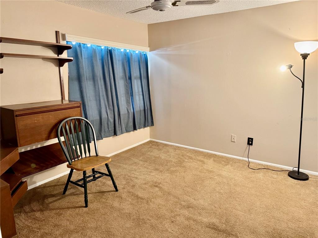 12300 Vonn Road, Unit 5304 Largo, FL 33774 - Photo 18 of 21 a view of a room with furniture and wooden floor