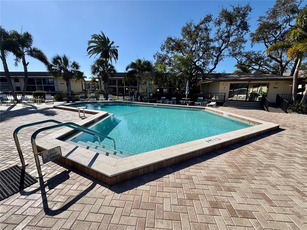 12300 Vonn Road, Unit 5304 Largo, FL 33774 - Photo 20 of 21 a view of a backyard with sitting area