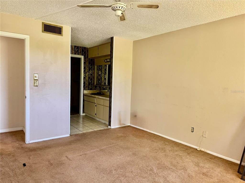 12300 Vonn Road, Unit 5304 Largo, FL 33774 - Photo 8 of 21 a view of a room with a hallway